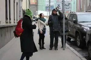 Group of students and a user expert encounter a sign that is a protruding object.