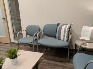 gray blue oversized chair in doctor's office