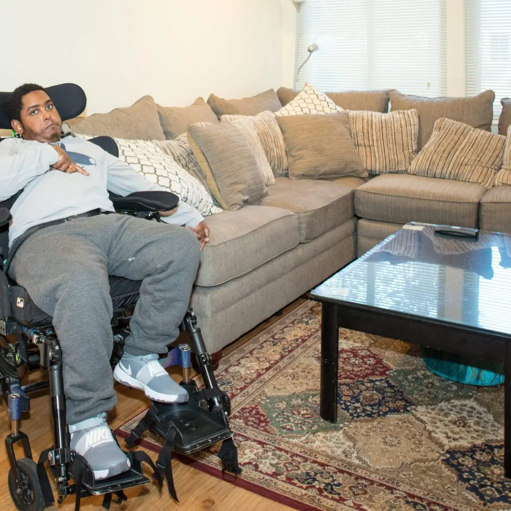 Abbi reclining in his chair