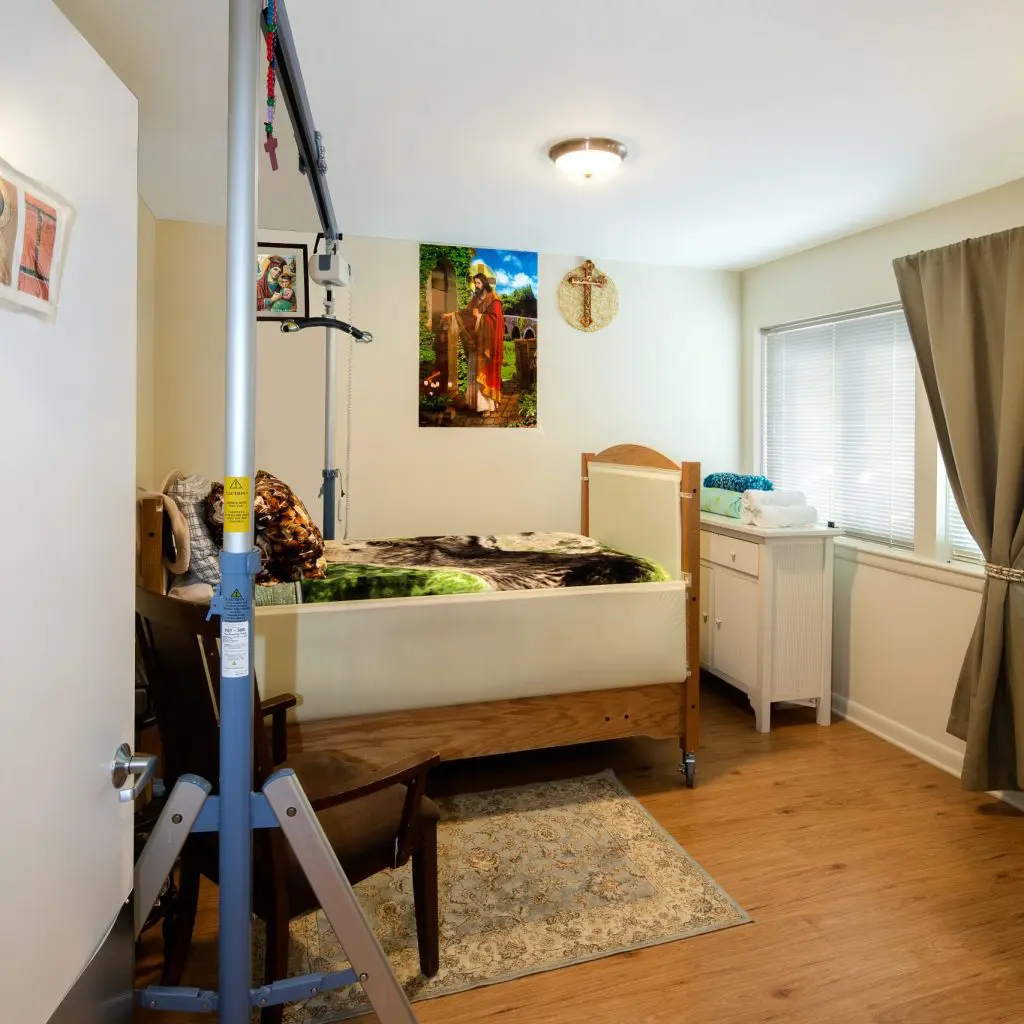 view into Abbi's bedroom, the lift is visible on the left