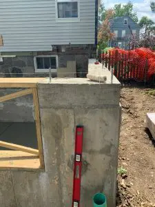 image of exterior wall with red slope measure