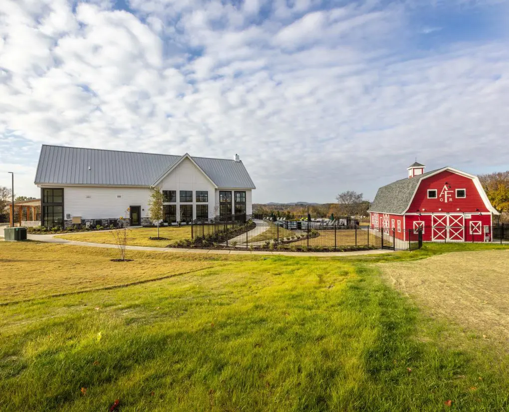 Exterior view of Alta Farms at Cane Ridge from field next to the historic barn