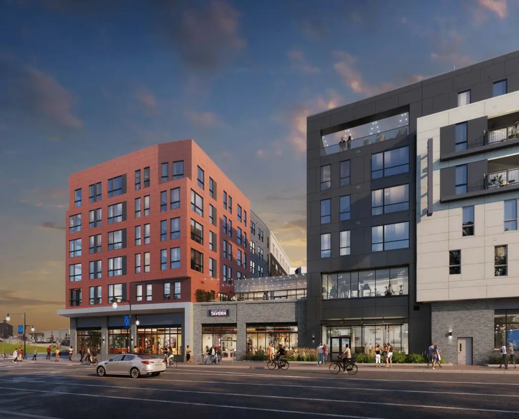 Exterior rendering of The Revington Apartment building and parking lot.