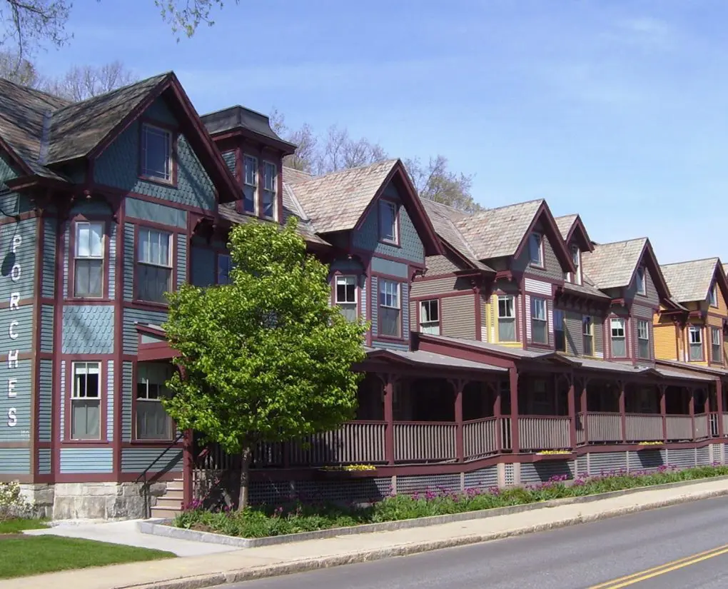 Street view of Porches Inn, a row of Victorian houses connected by a porch.