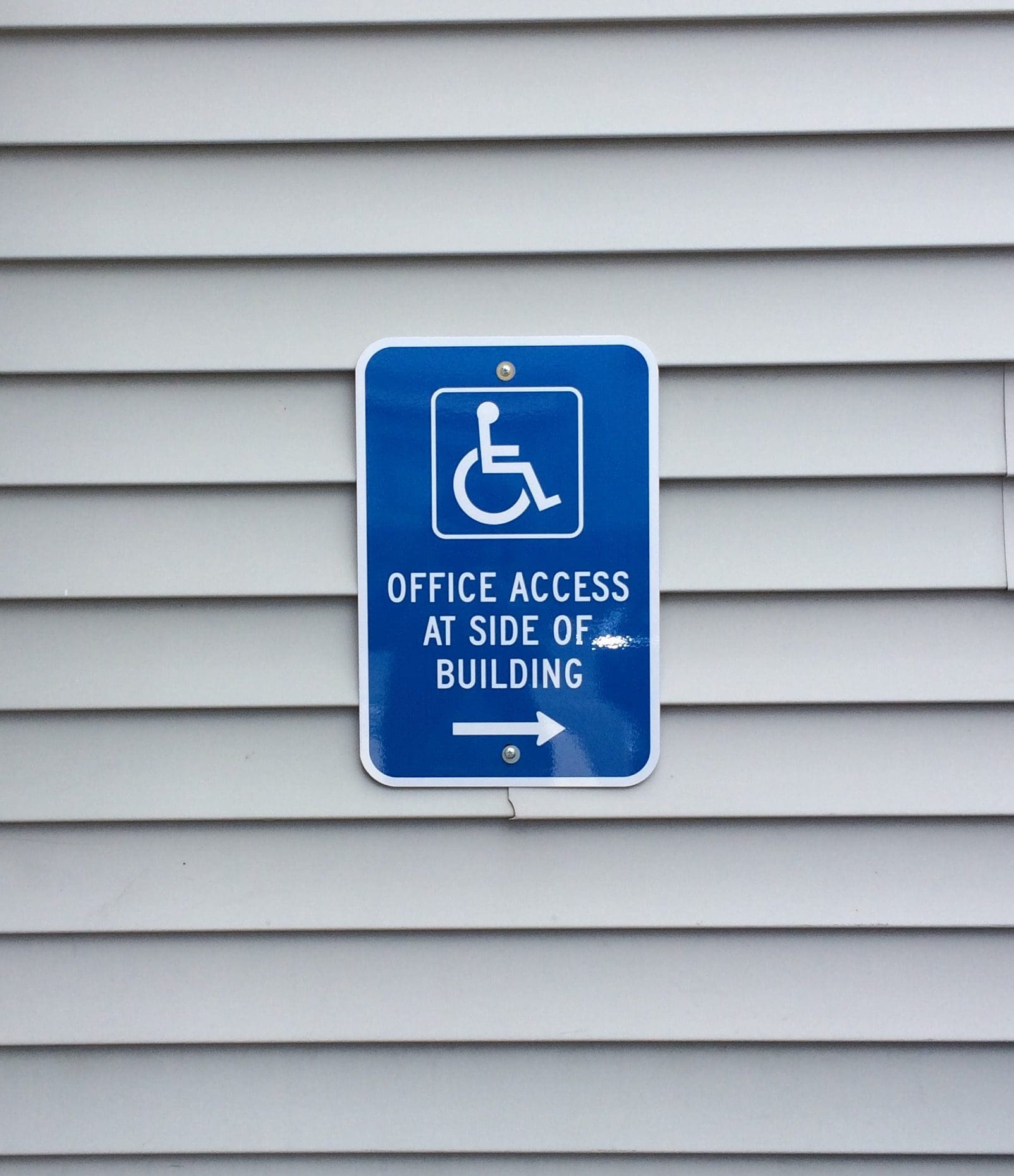 Directornal Signage to accessible netrance.